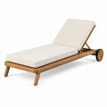 Tumbona de madera de teca con cojines de tela beige