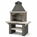 Barbacoa de piedra natural gris con estantería y chimenea